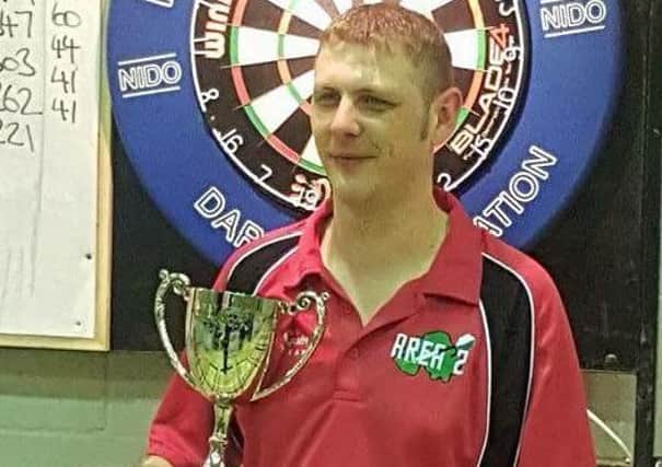 Geoffrey Matthews with the NI Gold Cup Singles (Tommy Forsythe Memorial) trophy he won on Saturday.