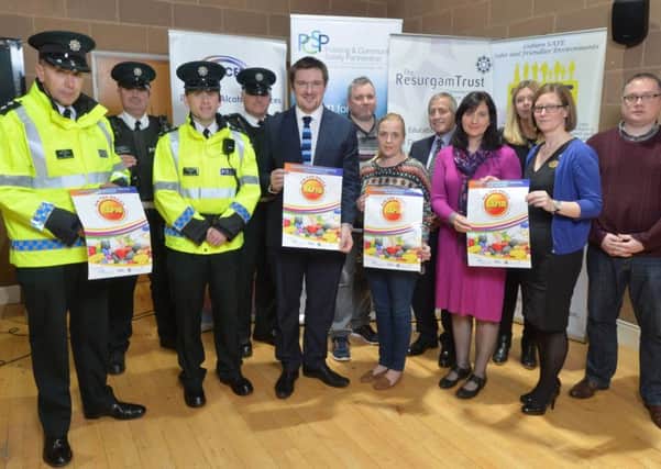 Councillor Scott Carson, Chairman of Lisburn and Castlereagh PCSP with Independent members, PSNI, ASCERT, Resurgam Trust and local pharmacist at the launch of the drugs disposal bin in the LaganView Enterprise Centre.