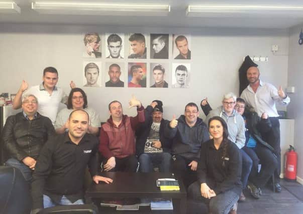 The team from Hawthorns Adult Centre following their big shave at Charisma Turkish Barbers last week.  INCT 50-726-CON