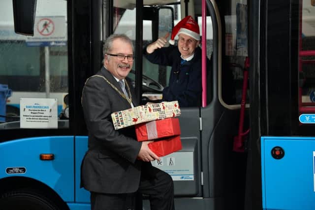 Ian Donaghey, President, Causeway Chamber of Commerce, joined Translink driver Colm McIlfatrick at the Coleraine Bus Centre to call on the public to support local businesses and public transport this Christmas.