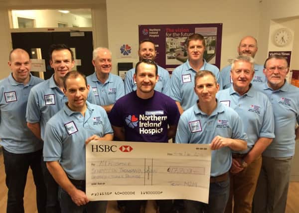 The M2M Cycle Challenge team - Gary McColskey, Alan Blaney, Nick Bonar, Paul Bonar, Marty Colvin, Garry Carpenter, Mark Grain, Michael McRoberts, David McKelvey, Ced Bonar and Des Bonar - visited the NI Hospice In-patient Unit at Whiteabbey Hospital to hand over the cheque for £17,703. INNT 51-500CON