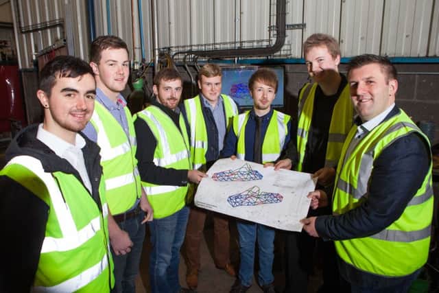 Mark Hutchinson, Managing Director, the Hutchinson Group (right) is pictured with Ulster Formula Student team members (L to R); Peter Donnelly, Gareth Montgomery, Jonny Mullan, Design Engineer, H360, Ryan Roberts, William Rollins and David McFarland.