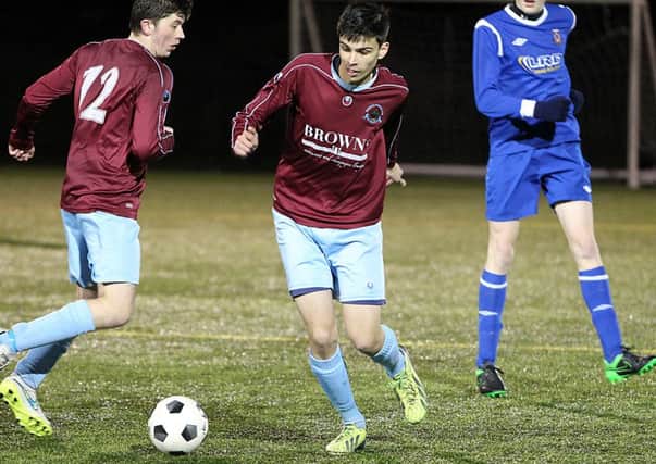 Institute's Todd Anderson in action against the Limavady Youths U17 team on Friday night. INLV5115-398KDR