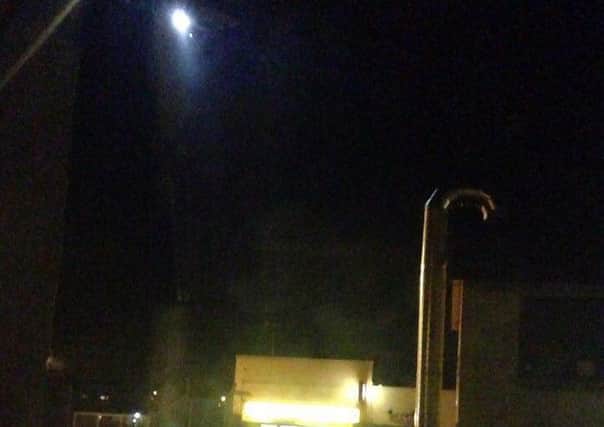 Police helicopter with its spotlight on Moneymore