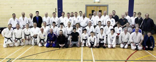 Photographed on Saturday afternoon at the Ballymena North complex was Iain Abernathy karate tutor, with some of the Chujo Karate Association members who took part in the 14th CKA seminar. INBT 50-802H