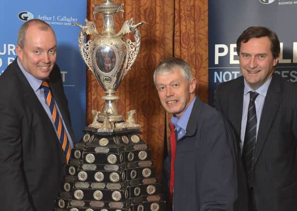 Derriaghy official David Skelton at the draw for the first round of the newly-sponsored Northern Cricket Union Arthur J. Gallagher Senior Challenge Cup with Gordon Markey of AJG (left) and the NCU President, Peter McMorran. The club will be away to either Donaghcloney or Academy on May 14.