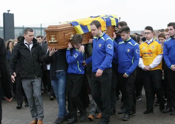 The coffin of Daryl Comac is carried to carland Road Cemetry today.
 PACEMAKER BELFAST   14/12/2015