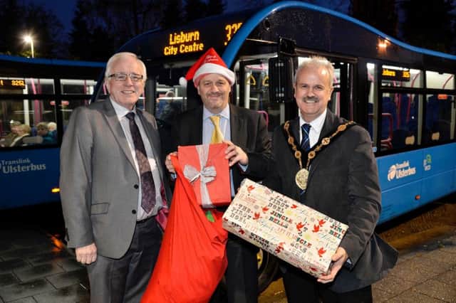 Alderman Allan Ewart, Development Committee Chairman, Lisburn & Castlereagh City Council, and Councillor Thomas Beckett, Mayor of Lisburn & Castlereagh City Council, joined Tranlink's Jim McAuley at Lisburn Bus Centre to encourage the public to support local businesses and public transport this Christmas. INUSchristmasshopping