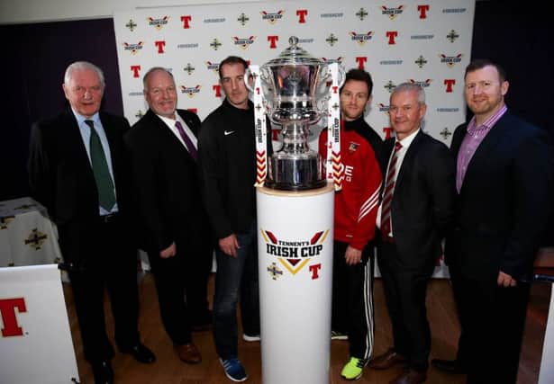 At the Irish Cup fifth round draw are IFA President Jim Shaw, Carrick Rangers secretary David Hilditch and manager Gary Haveron, Banbridge Town captain Ryan Moffatt and chairman Dominic Downey and Rod McCrory from sponsors Tennent's NI.