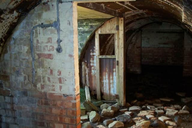 Inside one of the buildings at Seamount Heavy Anti-Aircraft Gun Battery.  INCT 52-720-CON