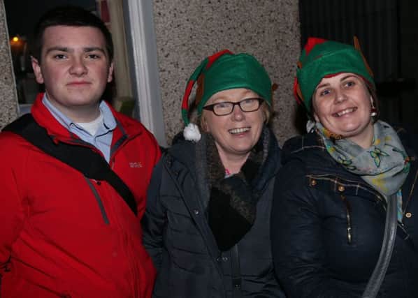 Conor McAfee Rose Grant and Una McCambridge Pictured at the Cushendall Lights switch on on Friday evening