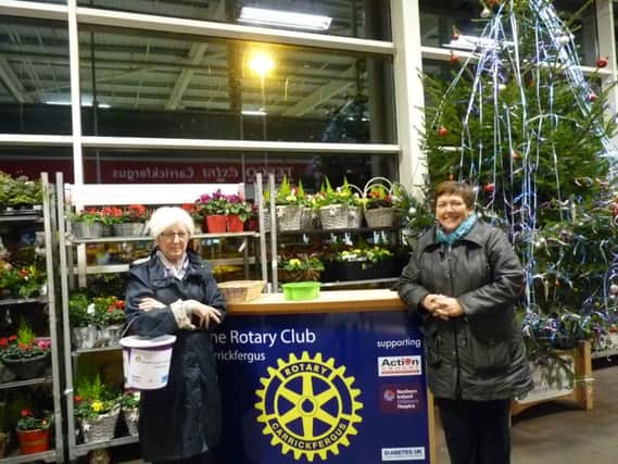 Collectors at The Tree of Hope, Mary Sinnamon, Rotary Club of Carrickfergus and Sharon Seaton, Abbey Insurance. INCT 51-758-CON