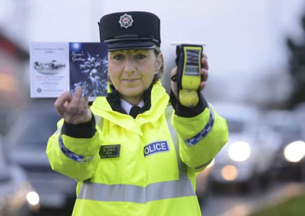 Pacemaker Press 26/11/2015
Inspector for Road Policing Rosie Leech  as Police launch the winter drink drive operation at Sprucefield near Lisburn on Thursday.

'There is no safe limit, so never drink and drive' is the key message from police as the 2015/16 winter drink drive operation began early this morning (26 November).

Assistant Chief Constable Alan Todd explained, "During last year's winter drink drive operation, we detected 270 people who took the risk of killing or injuring themselves, their family, friends or other innocent road users by deciding to drive after drinking.

"Considering that in some instances, we stopped drivers who were so drunk, they could barely stand when they got out of their vehicle, just beggars belief. At the other end of the spectrum, we detected some drivers who had gone out socialising and not intended to drive, but their circumstances changed and they decided to take a risk. A risk which resulted in a driving ban," he said.

In addition to running operations to catch drin
