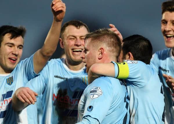 David Cushley is mobbed by his Ballymena United team-mates after his remarkable long-range goal in today's Danske Bank Premiership match against Linfield at the Showgrounds. Picture: Press Eye.