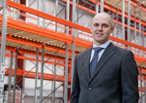 Philip Woolsey, General Manager of Huhtamaki Lurgan, in the new warehouse facility at the Lurgan plant, which has been built as part of a £4.9 million investment in new machinery. The investment, which is creating 12 new full-time jobs and 80 temporary jobs, will expand Huhtamakis product range