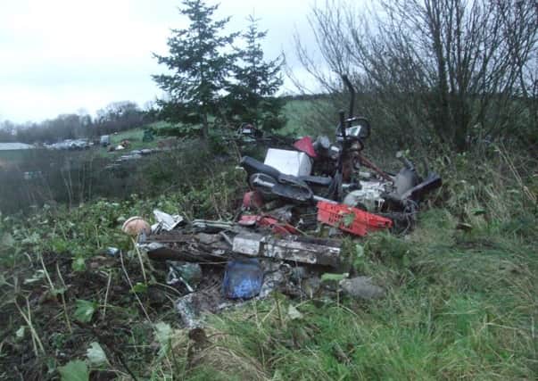 Items recently dumped at Aughnaskeagh Road, Dromara - members of the public are encouraged to contact the council if they have any information on the offender.