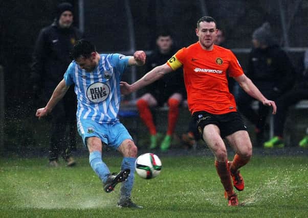 Conor McDonald for Warrenpoint and Aaron Harmon for Carrick Rangers.  Picture by Freddie Parkinson/Press Eye.  INLT 01-663-CON