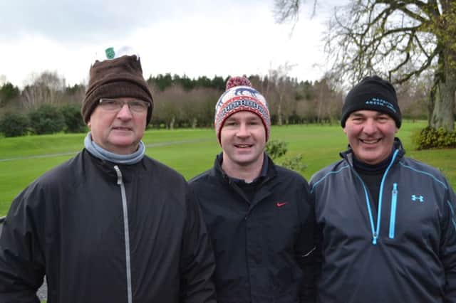 Overall Division Two winner Brian Wilkinson (centre) with David Galway and Noel Robinson.