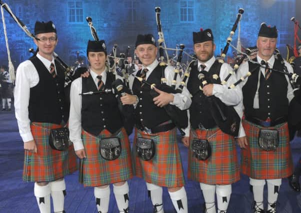Pipe Major Alyson McKnight and some members of Thiepval Memorial Pipe Band pictured at the Belfast Tattoo 2015.