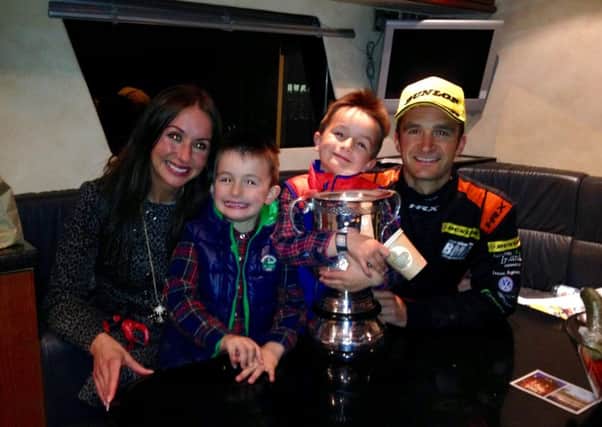 Colin Turkington celebrates his Independents' Drivers' Championship success. Wife Louise offered family support along with sons Adam and Lewis during the final round of the British Touring Car Championship.