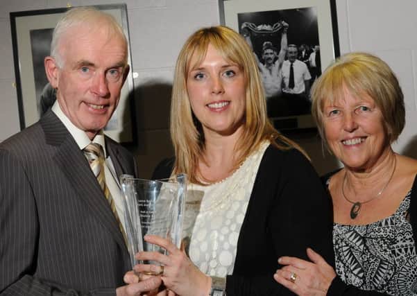 Dianne McMillan (nee Barr) pictured with her parents after being inducted to the Larne Sports Awards Hall of Fame in 2011.  INLT 10-823-CON (archive photo)