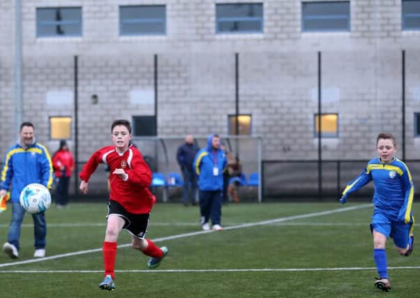 Carniny U12s Bailey Young in action during Satruday's NIBFA Plate with TTBS Minors at Ballymena Showgrounds 3G on Saturday morning. INBT 02-201CS