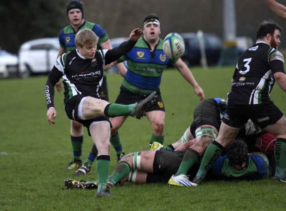 Andrew Semple clears his lines for City of Derry during Saturday's match against Seapoint. INLS0216-105KM