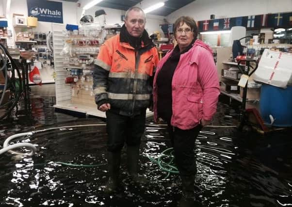 Cllr Declan McAlinden and SDLP MLA Dolores Kelly at Kinnego which has been flooded
