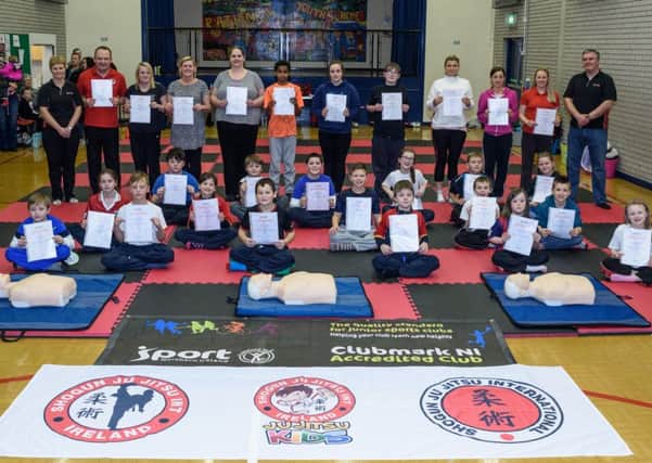 Shogun Ju-Jitsu International Ireland junior students, volunteers and coaches who recently passed their First Aid Community Course in Rathenraw Community Centre.