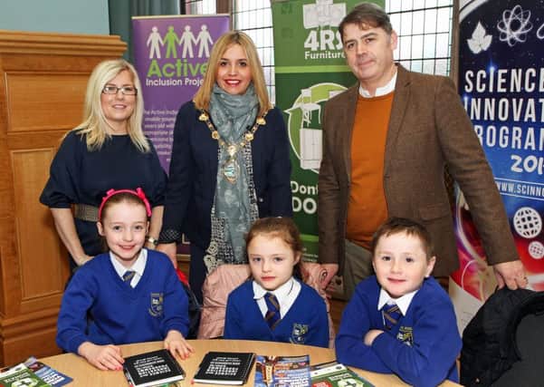 The Mayor Councillor Elisha McCallion, with children from the Chapel Road PS, attending a launch in the Guildhall,  by Derry City & Strabane District Council, of a primary schools wood recycling competition.  Included are Elsa Edwards, the councils legacy project officer and Joe Brolly, recycling manager with 4RS, competition sponsors.  0116-1987MT.