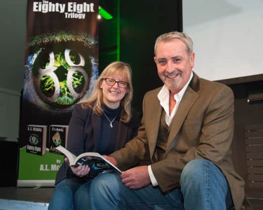 Sharon Barry, Belfast-based consultant and avid reader, meets author A.L. McAuley at the launch of his supernatural trilogy, Eighty Eight, at the Linen Hall Library in Belfast on Saturday 16 January.