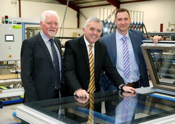 Press Release Image

Wednesday 13th January 2016

Picture by Darren Kidd / Press Eye.

Bell announces new jobs for Ballymena

Enterprise, Trade and Investment Minister, Jonathan Bell, is pictured with Austin McGillian, Chairman and Asa McGillian, Managing Director of Apeer, after announcing that the Ballymena window manufacturer is to create 25 new jobs in the town as part of a Â£1.7m investment.