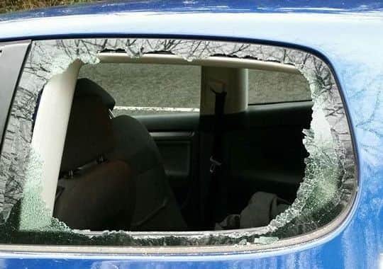 The damage to David Wright's car. INPT03-020