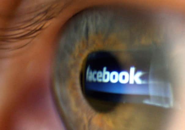 08/03/2009 PA File Photo of the logo of social networking website Facebook seen reflected in a person's eye. See PA Feature INTERNET Facebook Guidelines. Picture credit should read: 
Dominic Lipinski/PA Photos. WARNING: This picture must only be used to accompany PA Feature INTERNET Facebook Guidelines.