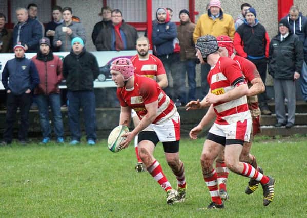 Randalstown move the ball quickly in Saturday's match against Ballymoney, played in front of a good crowd at Neillsbrook. INBT 04-825H
