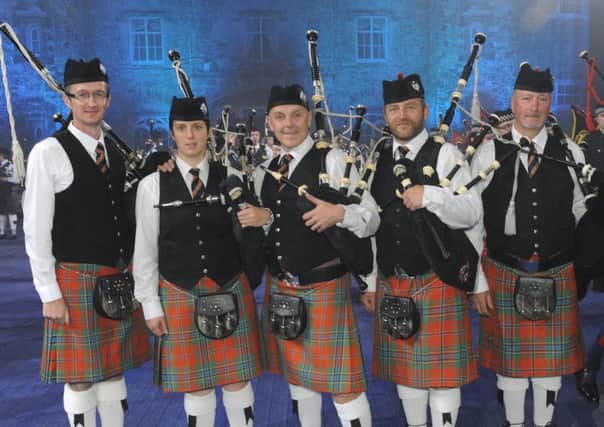 Pipe Major Alyson McKnight and members of Thiepval Memorial Pipe Band at the Belfast Tattoo 2015.