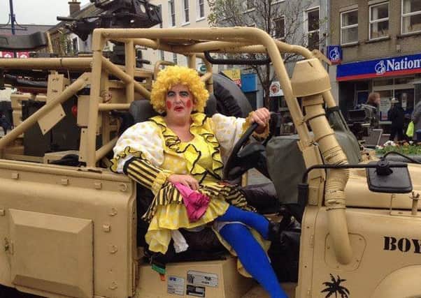 Dame Twanky, played by John Millar in Coleraine Town Centre on Saturday promoting the show.