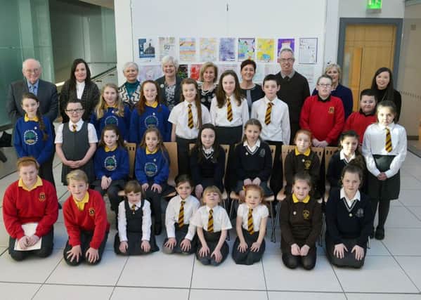 Photographed at the Braid Arts Centre were children of Camphill PS, Buick Memorial PS, Ballykeel PS, St Colmcille's PS and St Pauls PS who were winners in the recent Enkalon Foundation art competition to celebrate Ballymena Festival centenary. INBT 05-812H