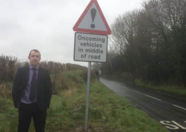 Sinn FÃ©in MLA DaithÃ­ McKay has welcomed the installation of warning signage at a narrow stretch of the Townhill Road. (Submitted Picture).