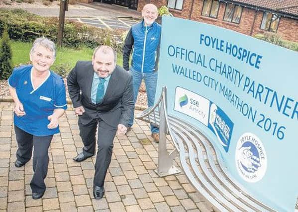 Pictured at the launch of the Walled City Marathon/Foyle Hospice Charity Partnership are Gerry Lynch, representing the Walled City Marathon Committee, Foyle Hospice Staff Nurse Marion ODonnell and Hospice CEO Donall Henderson.