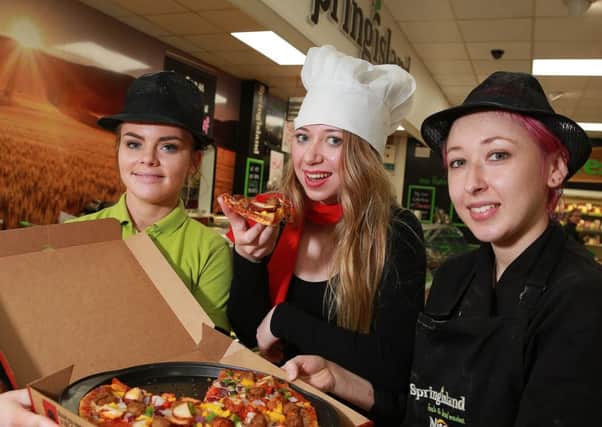 Pictured (l-r) celebrating National Pizza Day at Springisland Supermarket, which just happens to fall on Pancake Tuesday this year, are Cara Carlin, Coalisland,  Leah Johnston, Ardboe  and  Shannen Woods, Coalisland