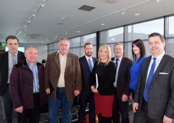 Brian McClure DFP, Glyn Roberts NIIRTA, Local MLAs Michelle ONeill and Ian Milne with some Mid-Ulster Sinn FÃ©in Councillors., pictured at the meeting in the Burnavon.