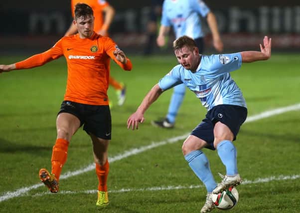 Ballymena United's David Cushley attempts to find a way past Carrick Rangers' Daniel Kelly  during Tuesday nights Danske Bank Premiership game at the Showgrounds. Picture: Press Eye.
