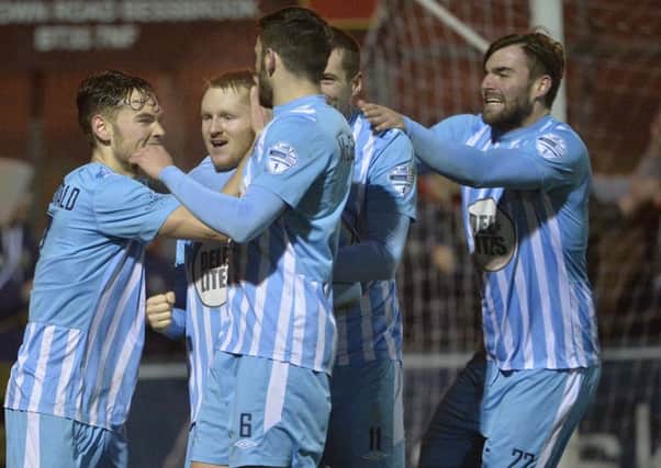 Warrenpoint's Martin Murray celebrates after putting his side into a 1-0 lead against Portadown.