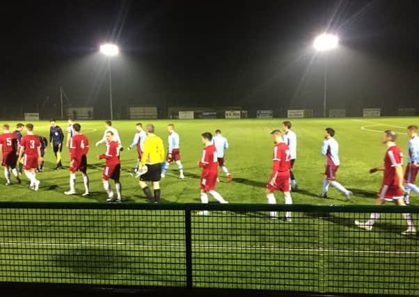 Annagh United and Knockbreda players walk out for the start of Tuesday's Irish Cup tie.