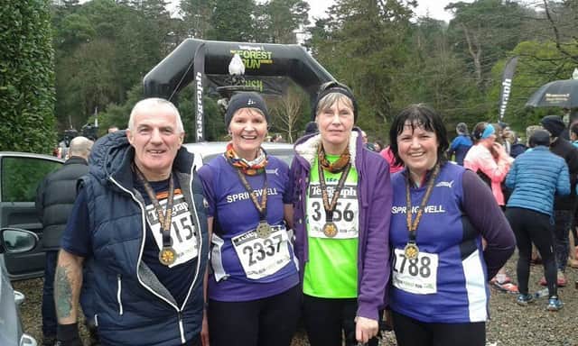 Bob McLaughlin, Lorraine Abernathy, Judith McLaughlin and Catherine Byers after the Mount Stewart trail race