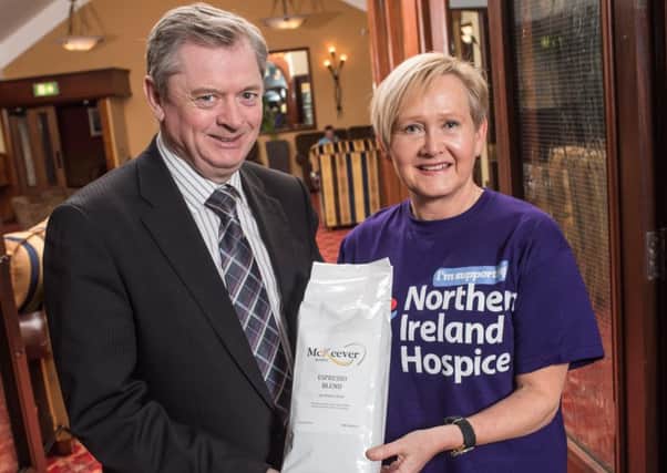 Eugene McKeever, Managing Director of McKeever Hotels, with Karen Humphreys from NI Hospice. INNT 04-505CON