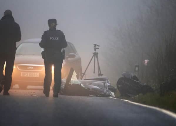 Officers at the scene of a fatal one-vehicle  crash which killed two teenage students on the Cladymilltown Road between Markethill and Newtownhamilton in County Armagh