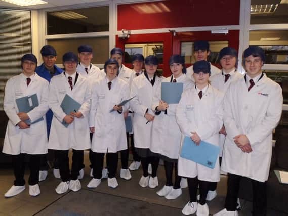 Carrickfergus Grammar School year 12 Business Studies pupils visit Schrader Electronics.  INCT 04-708-CON