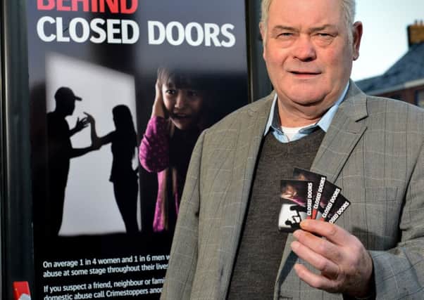 Chair of the Mid Ulster PCSP with the new Behind Closed Doors advertising campaign.